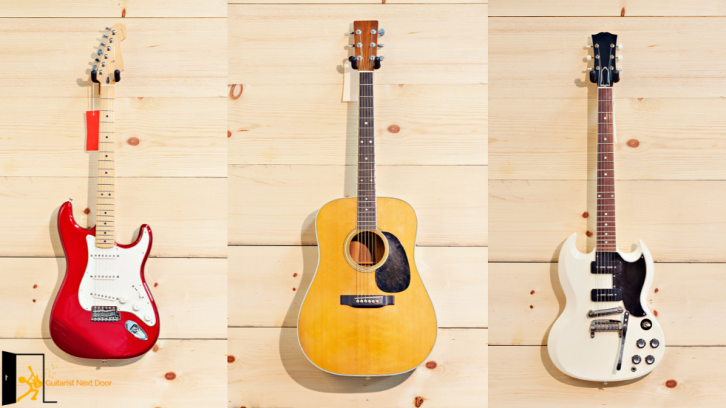 Photo displays 3 guitars on wall hangers