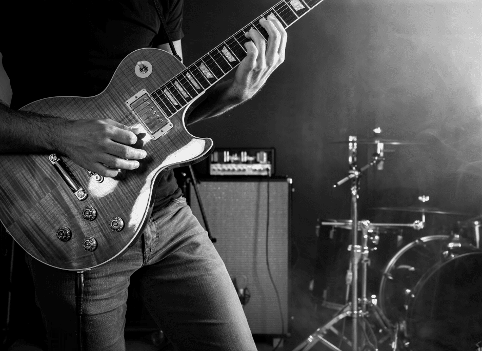 Photo shows reader an guitar player who is performing