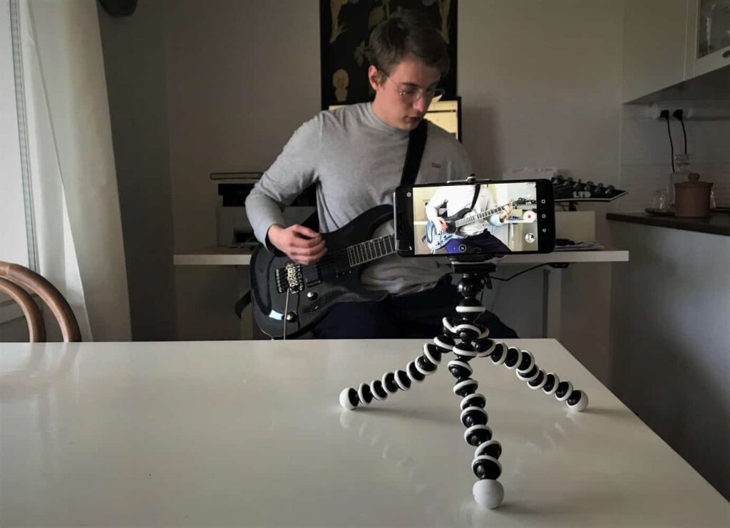 Photo shows readers how to setup their phone when filming guitar playing