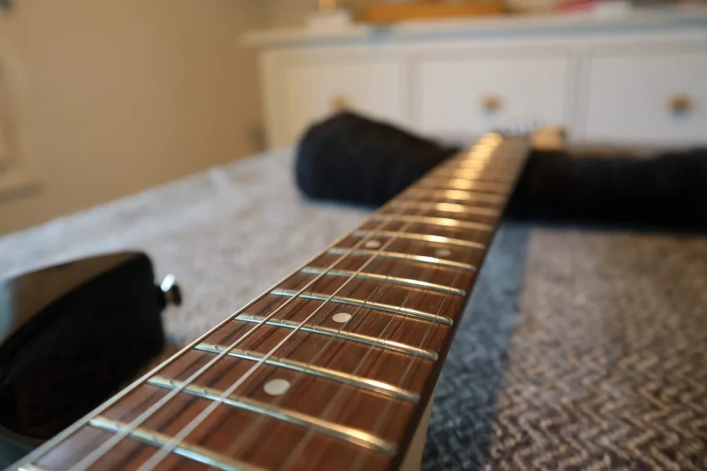 photo displays fretboard of Yamaha pacifica 112V