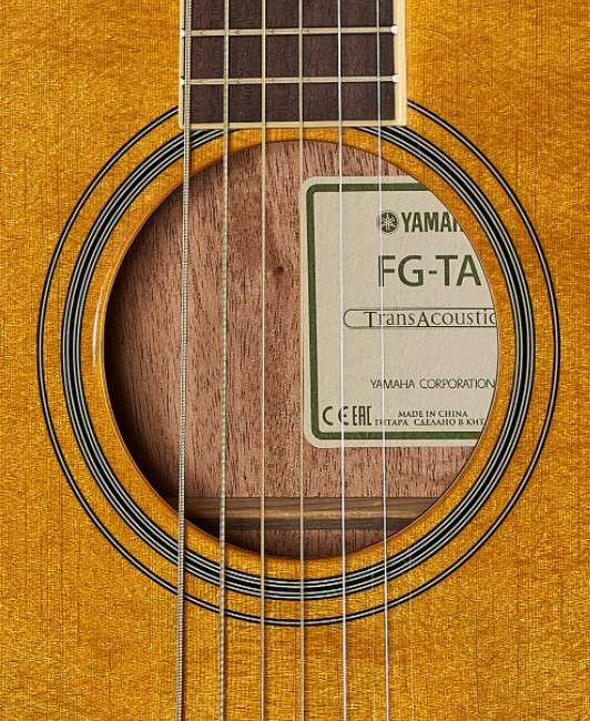 photo reveals that Yamaha FG-TA Transacoustic is made in China