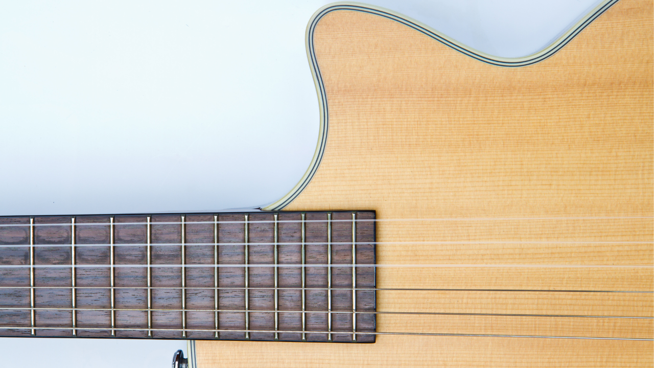 Displays acoustic guitar without soundhole