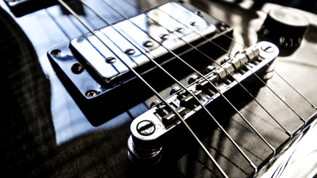 displays a Electric Guitar with Piezo Pickups