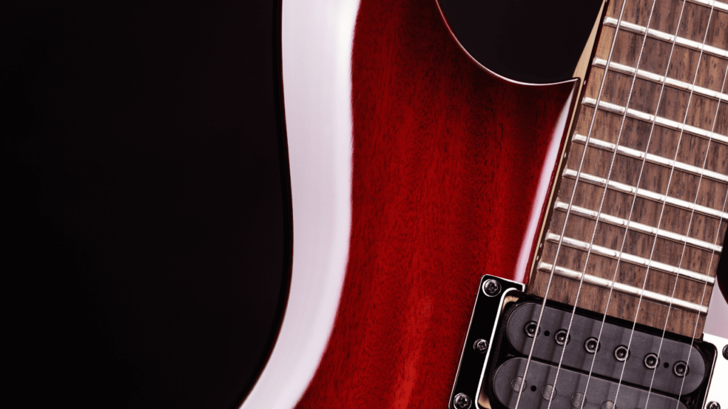 displays a Guitar With Extra Jumbo Frets