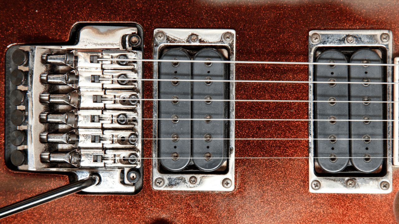displays Guitar With Floyd Rose bridge