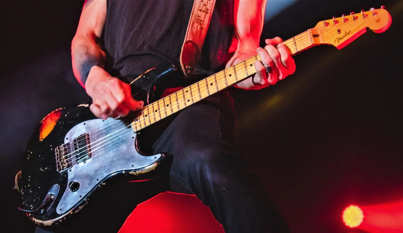 displays Guitar With One Pickup