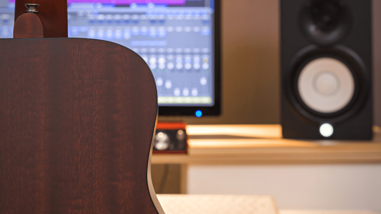 displays Guitar With Rosewood Back and Sides