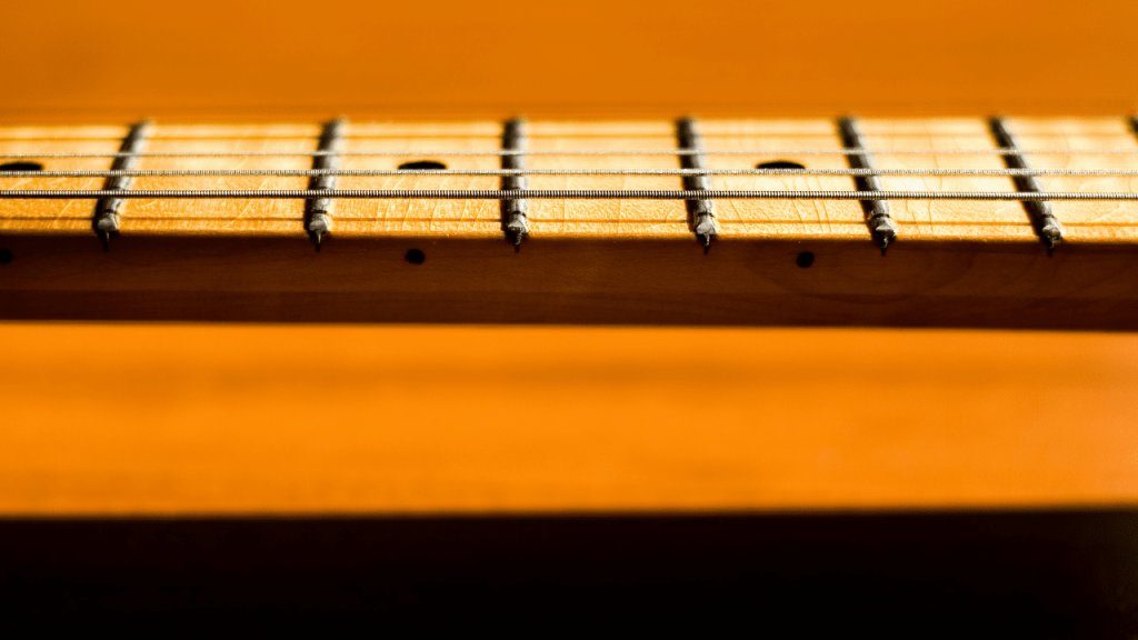 displays v-shaped guitar neck