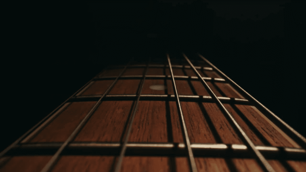 displays a close look of a Guitar with a Compound Radius Fretboard