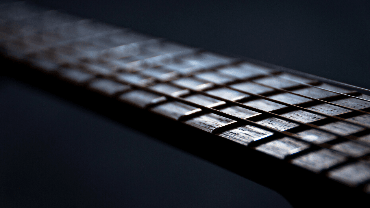 displays a Guitar with D Shaped Neck