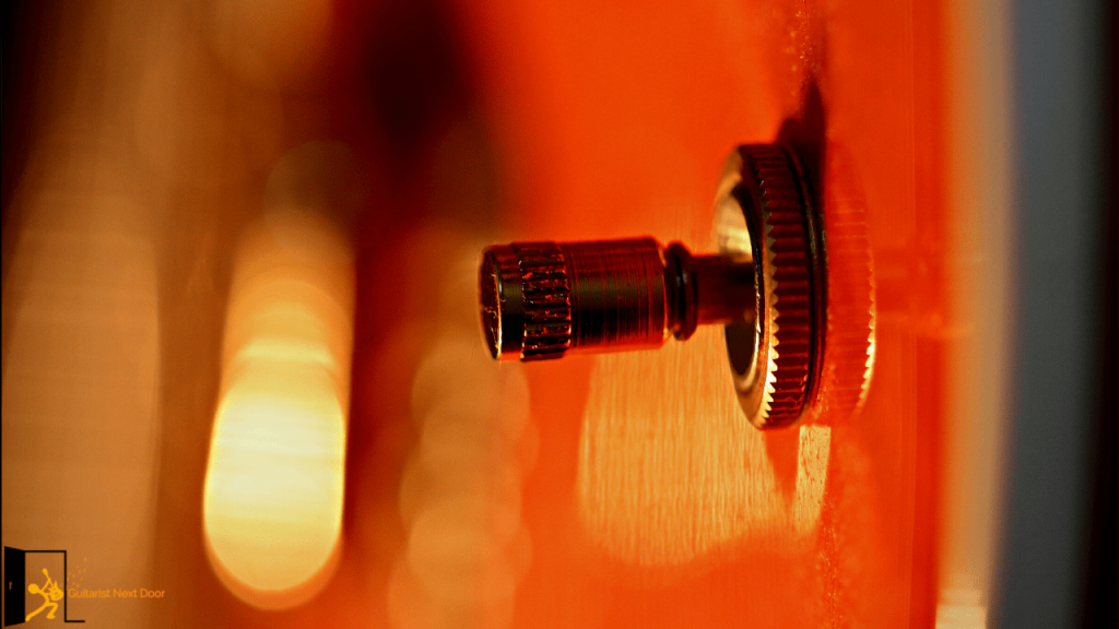 displays a guitar with a kill switch