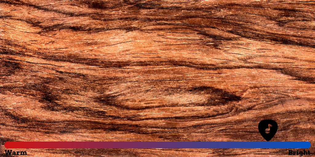 displays a piece of Cocobolo wood