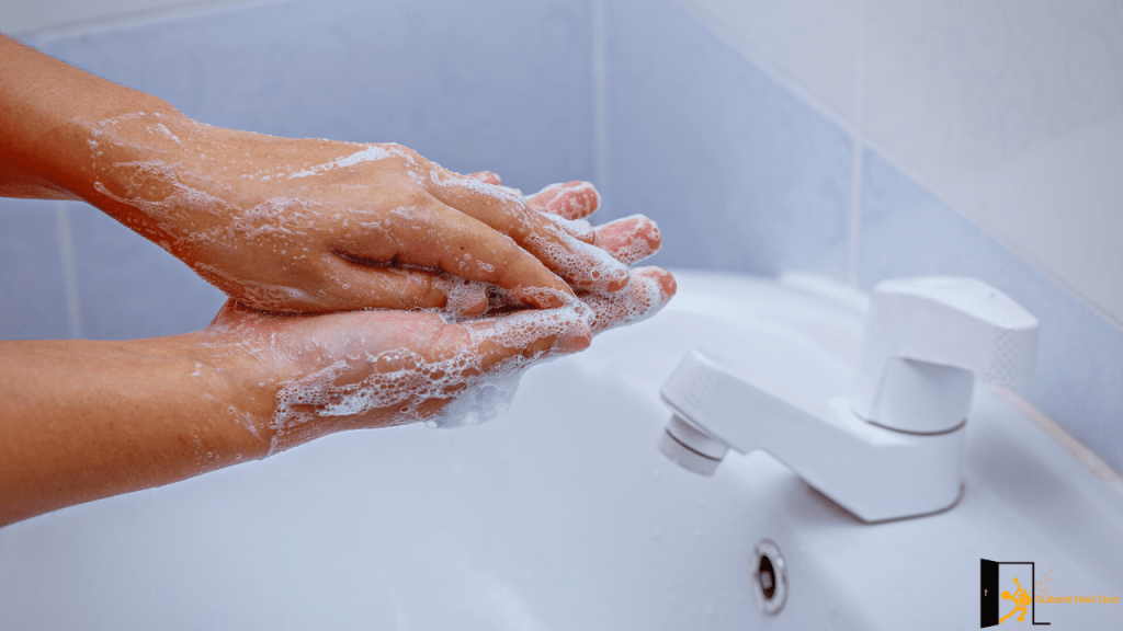 a person cleaning hands