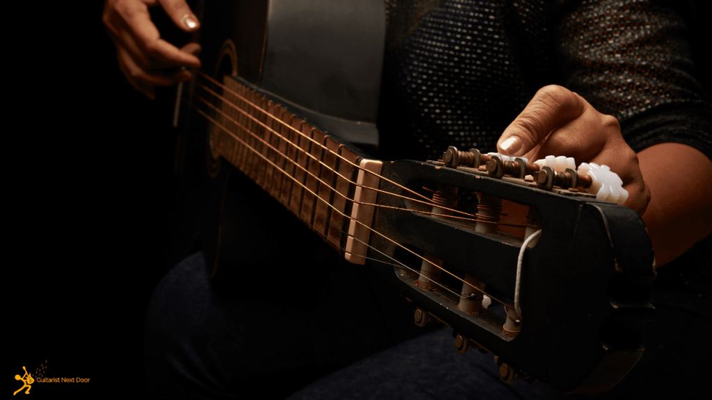 guitar player Loosening Guitar Strings