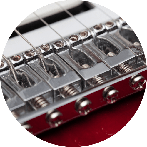 displays saddles of an Electric guitar