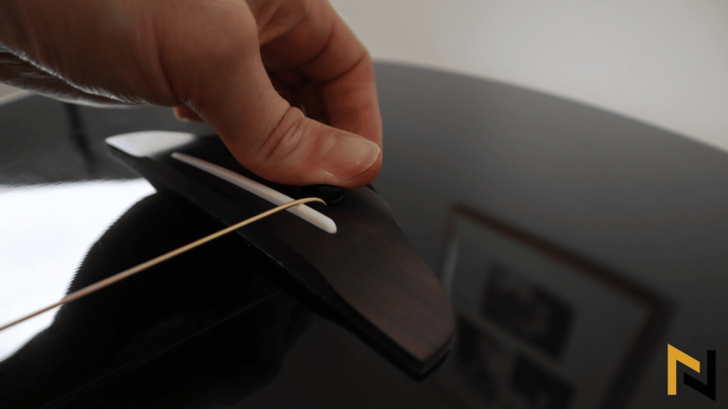 Steel-String Acoustic Guitar String Change - Press Bridge Pins
