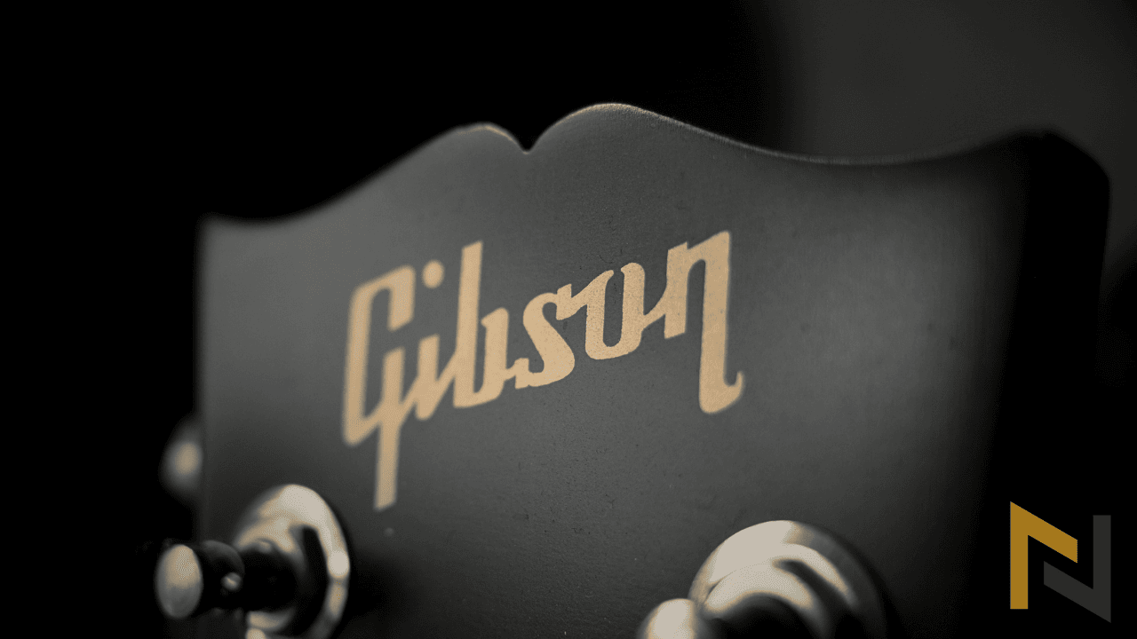 displays a top of the a headstock of a Gibson Les Paul